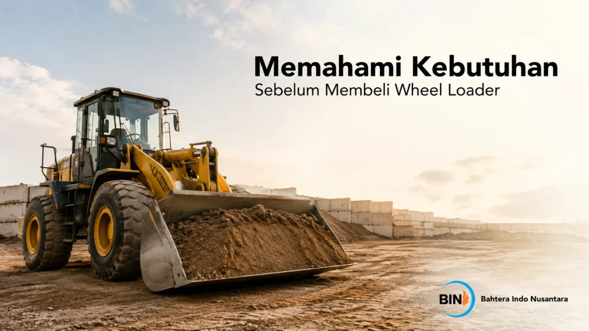 Wheel loader beroperasi di area proyek konstruksi sebagai ilustrasi pentingnya memahami kebutuhan sebelum memilih alat berat yang sesuai.
